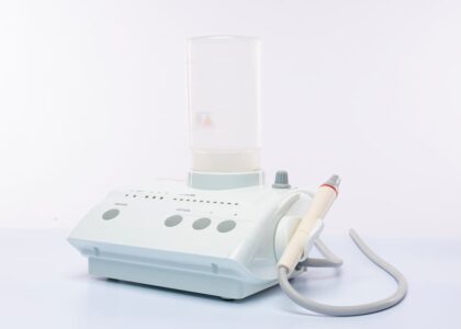 best dental irrigators — High-quality dental suction device on a white background, ideal for dental care contexts.