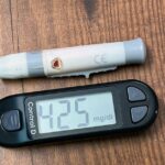 A glucometer displaying high glucose reading of 425 mg/dL, essential for diabetes care.