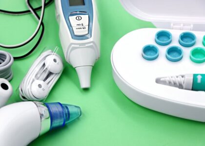 A variety of ear care devices including ear buds, medical instruments, and cleaning tools.