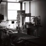 how to set up a cpap machine — A well-equipped examination room in a hospital featuring advanced surgical instruments and machinery.