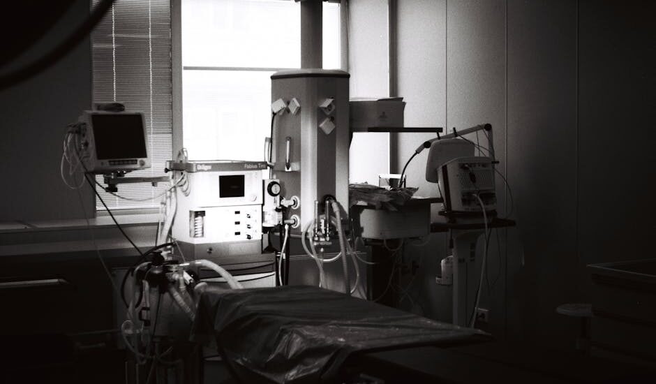 how to set up a cpap machine — A well-equipped examination room in a hospital featuring advanced surgical instruments and machinery.
