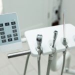 Close-up of modern dental tools and control panel in a clinic, showcasing professional equipment.