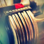 Image showing the weight adjustment mechanism of adjustable dumbbells, relevant to assembling them.