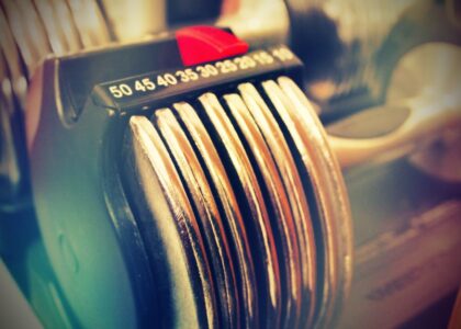 Image showing the weight adjustment mechanism of adjustable dumbbells, relevant to assembling them.
