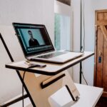 A smart desk featuring a laptop, illustrating key features for productivity and comfort.
