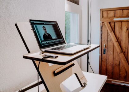 A smart desk featuring a laptop, illustrating key features for productivity and comfort.