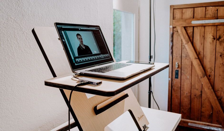 A smart desk featuring a laptop, illustrating key features for productivity and comfort.